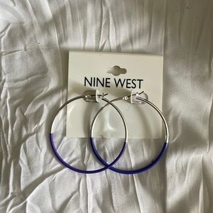 Nine West silver hoops with purple detailing!